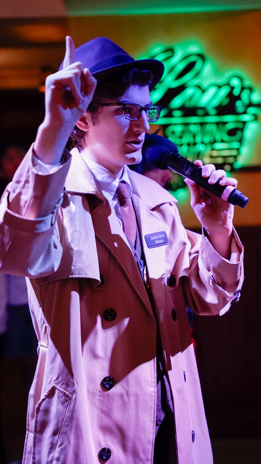 A Murder Mystery Company actor working the room at a Austin show