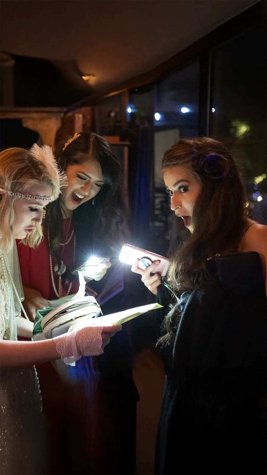 Guests at a Murder Mystery Company public dinner show in Austin